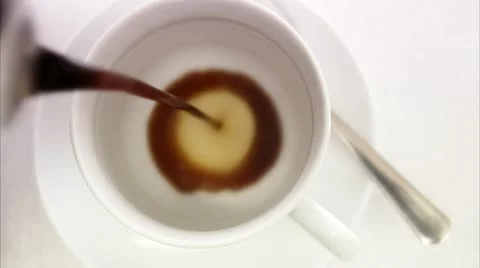 Pouring coffee into a cup, adding sugar Video stock 11286550