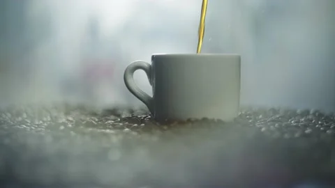 Pouring coffee into a cup for breakfast. Stock Footage 237618585