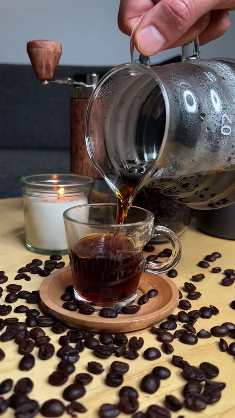 Pouring Coffee into Cup with Coffee Beans – Perfect for Social M Stock-Footage 297666169