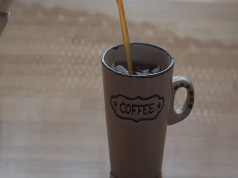 Pouring coffee in the cup Stock Footage 80482299