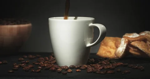 Pouring Coffee into Cup Stock Footage 135649135