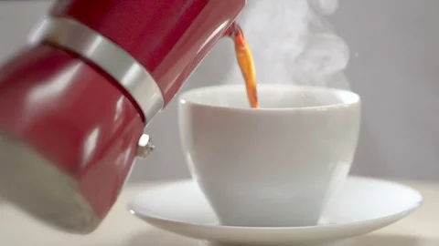 Pouring Coffee Into Cup in morning breakfast, Steaming fresh Stock Footage