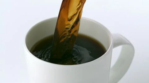 Pouring coffee into cup, Slow Motion Stock Footage 15107927
