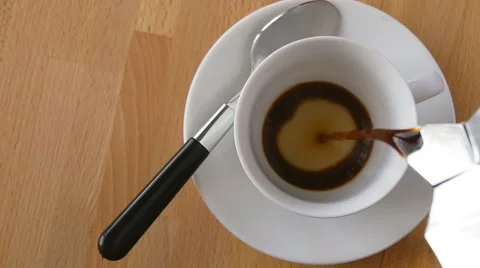 Pouring coffee into cup, slow motion Video stock 48816903