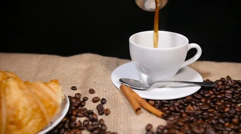 Pouring Coffee into Cup with Steam Stock-Footage 59906565