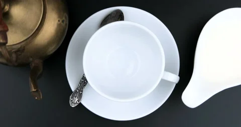 Pouring Coffee In a Cup. Top view Stock Footage 109160889