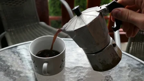 Pouring Coffee From Espresso Maker Stock Footage 79096259