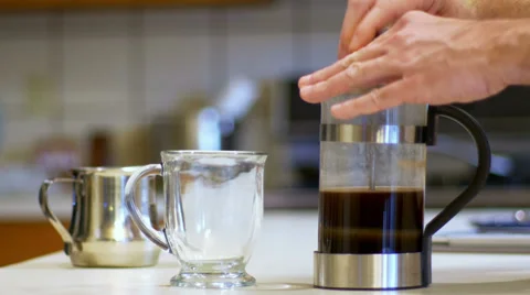 Pouring coffee in a mug 4K Video stock 38711279