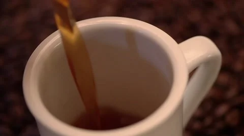 Pouring coffee in a mug Stock Footage 58265374