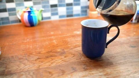 Pouring Coffee into Mug Stock Footage 92843626