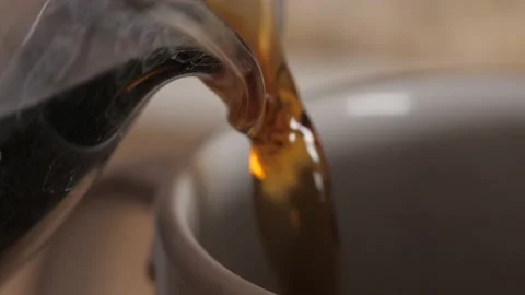 Pouring Coffee Into A Mug - Slow Motion Stock Footage 149273575