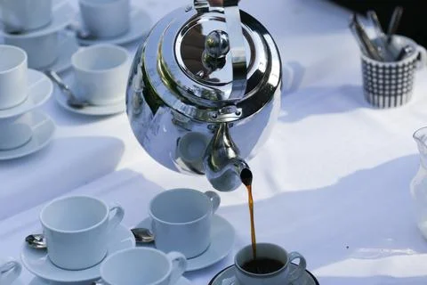Pouring coffee Stock Photos