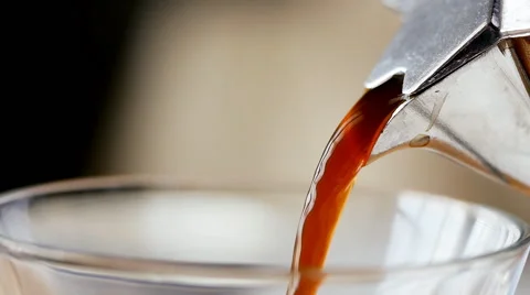 Pouring coffee from pot, close up Stock Footage 48820129