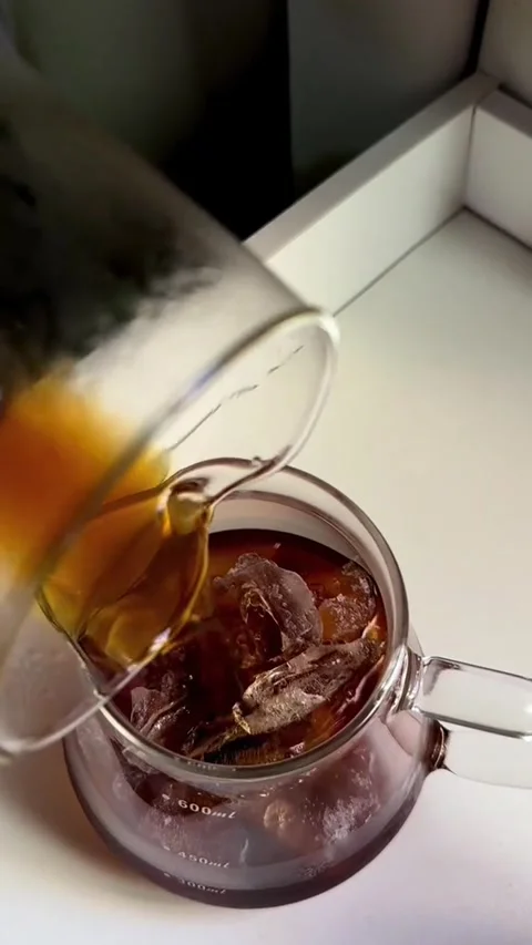 Pouring coffee from a pot Stock Footage 316746730