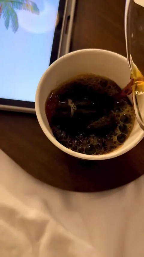 Pouring coffee from a pot Stock Footage 316746737