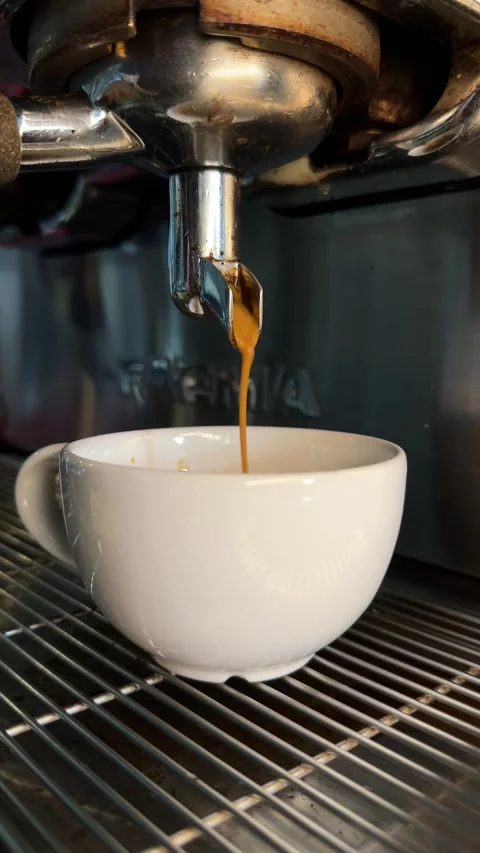 Pouring coffee of profesional coffe machine Stock Footage 277135706