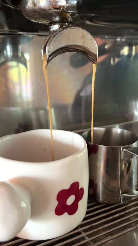 Pouring coffee stream from machine in the cup. Cafe making hot Espresso. Flowing 스톡 동영상 280039972