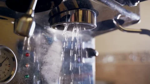 Pouring coffee stream from professional machine in cup. Stock Footage 116710738