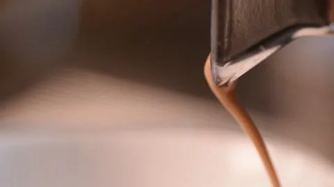 Pouring coffee stream from professional machine in cup. Stock Footage 151205308