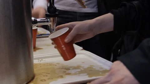 Pouring Coffee While Holding A Stroopwafel Video stock 127496127