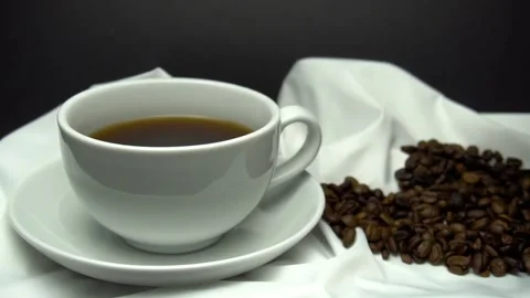 Pouring coffee into the white cup. Stock Footage 86215192