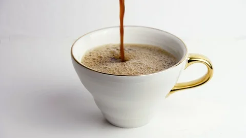 Pouring coffee in a white cup Stock Footage 95174175