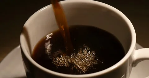 Pouring coffee into white cup 库存影片 162610856