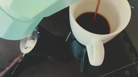 Pouring coffee into white cup Stock Footage 265867457