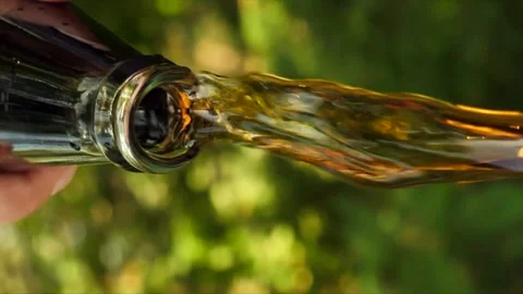 Pouring cola.The camera is moving. slow motion video. vertical screen Stock Footage 259187315