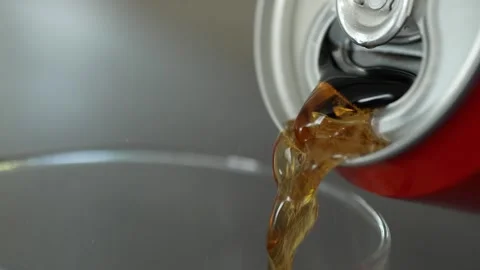 Pouring Cola into a glass Stock Footage 249934953