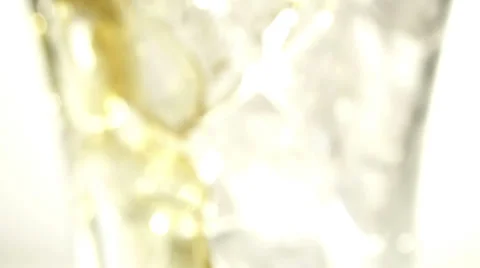 Pouring Cola with ice and bubbles in the glass. Close up soda soft drink. Slow Vidéo 38992902