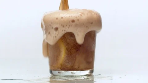 Pouring Cola with ice and bubbles Stock Footage 124038104