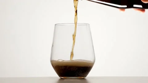 Pouring cola in slow motion 4k Stock Footage 175336531
