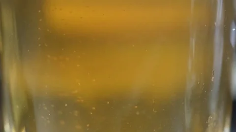 Pouring cold beer bubbles slow motion Stock Footage 83995668