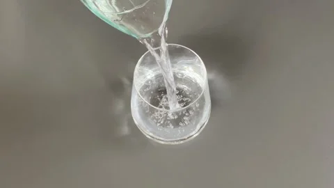 Pouring cold water slowly 库存影片 341983083