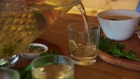 Pouring compote into an empty glass Stock Footage 139384468