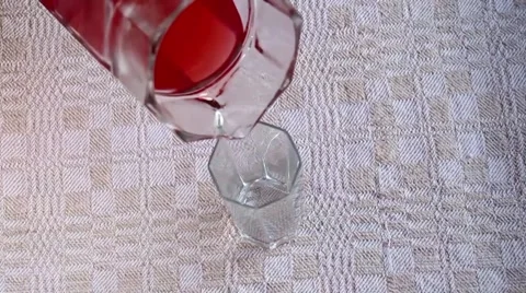 Pouring the compote in a glass Stock Footage 66519410