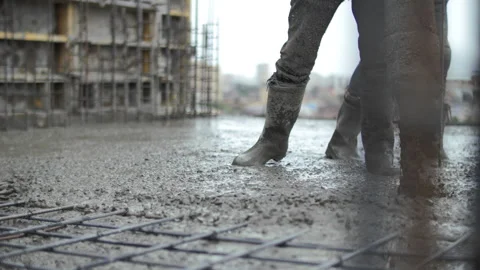 Pouring concrete into the floor close up Stock Footage 282240378