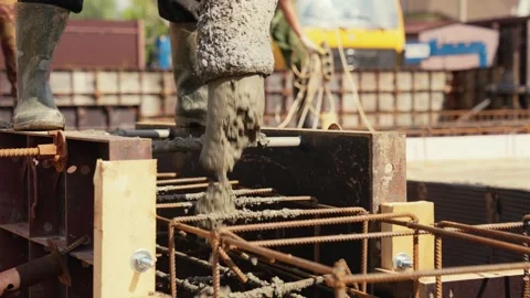 Pouring concrete into formwork on construction site Stock Footage 341294461