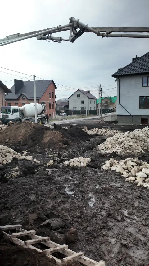Pouring Concrete for Foundation,Foundation Construction Process Stock Footage 300060827