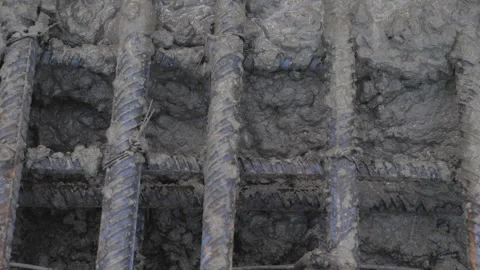 Pouring concrete into a metal structure Stock Footage 280969083