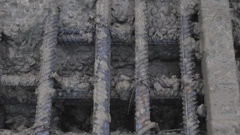 Pouring concrete into a metal structure Stock Footage 280969102