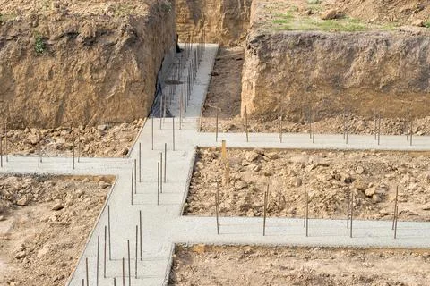 Pouring a concrete solution of the foundation of the construction of a countr Foto stock
