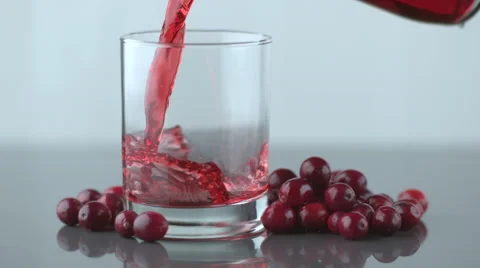 Pouring cranberry juice in slow motion; shot on Phantom Flex 4K at 1000 fps Stock Footage