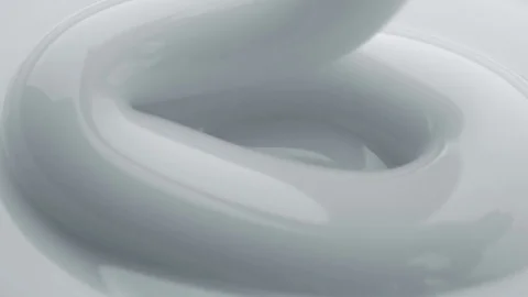 Pouring cream. Close-up shot. Stock Footage 74684701