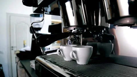 Pouring a Cup of coffee from the coffee machine Stock-Footage 66453901