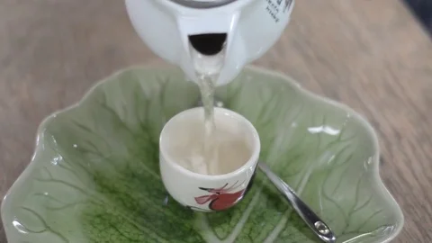Pouring cup of hot tea. Stock Footage 80047219