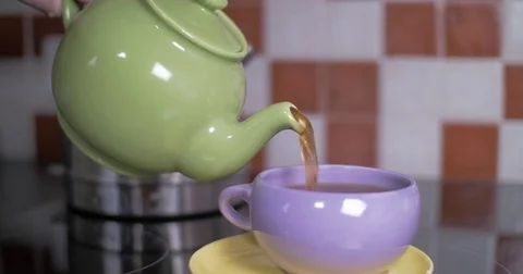 Pouring a Cup of Tea Stock Footage 84830465