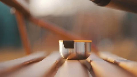 Pouring a cup of tea from a thermos Stock Footage 70810793