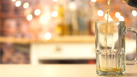 Pouring a darker beer  Stock Footage 102453657